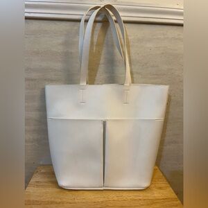 Neiman Marcus white tote bag, featuring a minimalist design